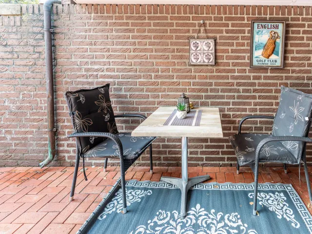 Überdachter Sitzplatz vor den Apartments
